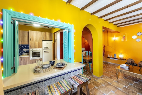 Casa Feliz Two-Bedroom Apartment (A406) | Private kitchen | Full-size fridge, microwave, oven, stovetop