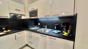 Fridge, microwave, coffee/tea maker, electric kettle