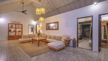 Family Villa | Living area | 60-inch Smart TV with satellite channels, TV, Netflix