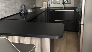 Villa, 2 Bedrooms | Private kitchen | Full-sized fridge, oven, stovetop, dishwasher