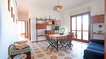 Apartment, 2 Bedrooms | Living area | Flat-screen TV