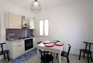 Apartment, 2 Bedrooms | Private kitchen | Fridge, oven, stovetop, espresso maker