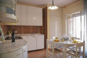 Apartment, 1 Bedroom | Private kitchen | Full-sized fridge, oven, stovetop, electric kettle - Casa Rosa (Cefalù)