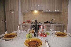 Apartment, 2 Bedrooms | Private kitchen | Full-size fridge, oven, stovetop, electric kettle