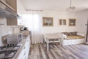 Departamento, 1 habitación (Bilocale) | Área de sala de estar | Televisión LCD 