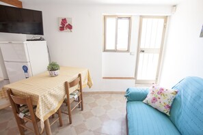 Appartement, 1 chambre | Coin séjour