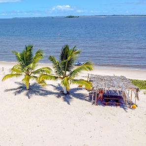 On the beach, white sand, beach shuttle