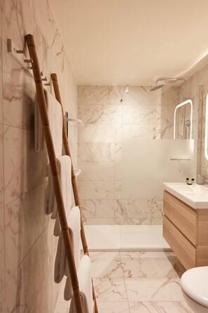 Hair dryer, towels, soap, shampoo