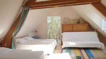 Premium bedding, desk, laptop workspace, blackout curtains