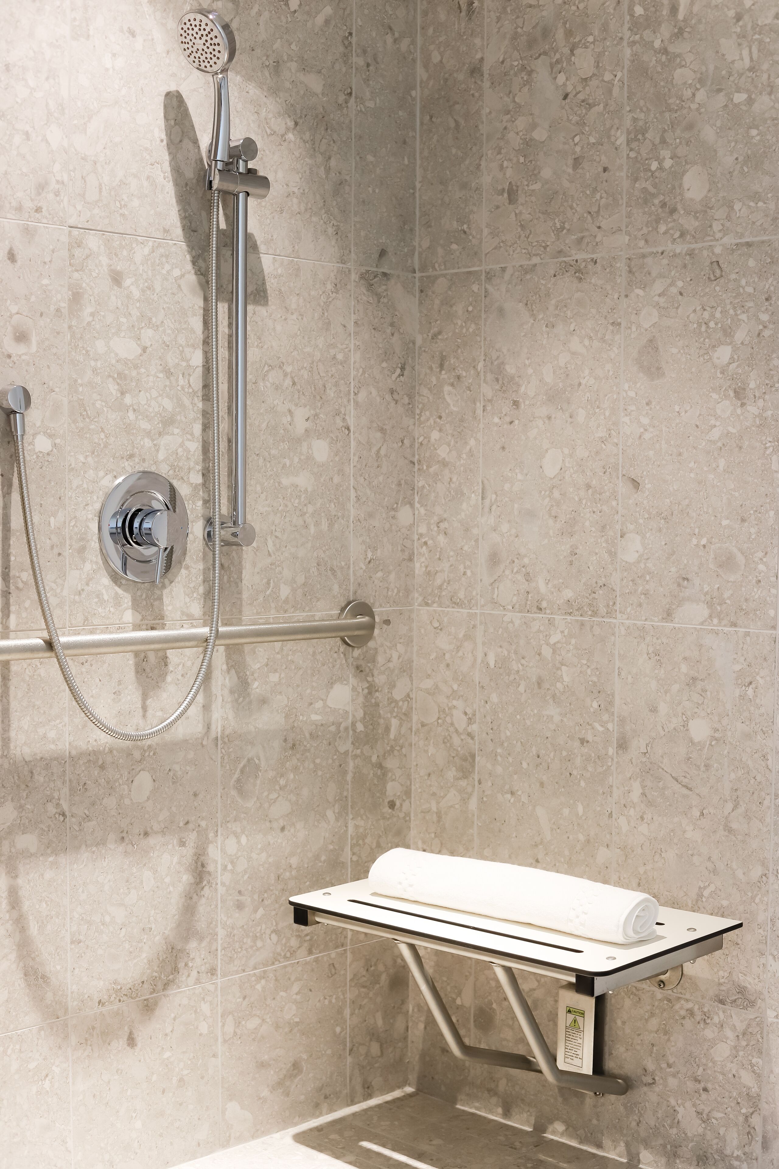 shower, rainfall showerhead, designer toiletries, hair dryer