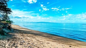 On the beach, sun loungers, beach towels