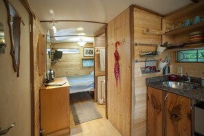 Iron/ironing board, travel crib, free WiFi, bed sheets