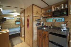 Iron/ironing board, travel crib, free WiFi, bed sheets