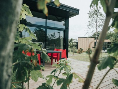 Modern Chalet With Terrace, Located in a Holiday Park 800 m. From the Beach