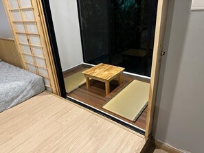 Fer et planche à repasser, draps fournis