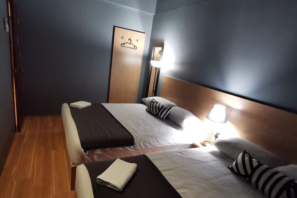 Superior suite, 2 slaapkamers (L51) | Een strijkplank/strijkijzer, beddengoed