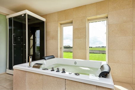 Villa | Bathroom | Shower. Stately Villa in Wierum with Fantastic Views & Hot Tub