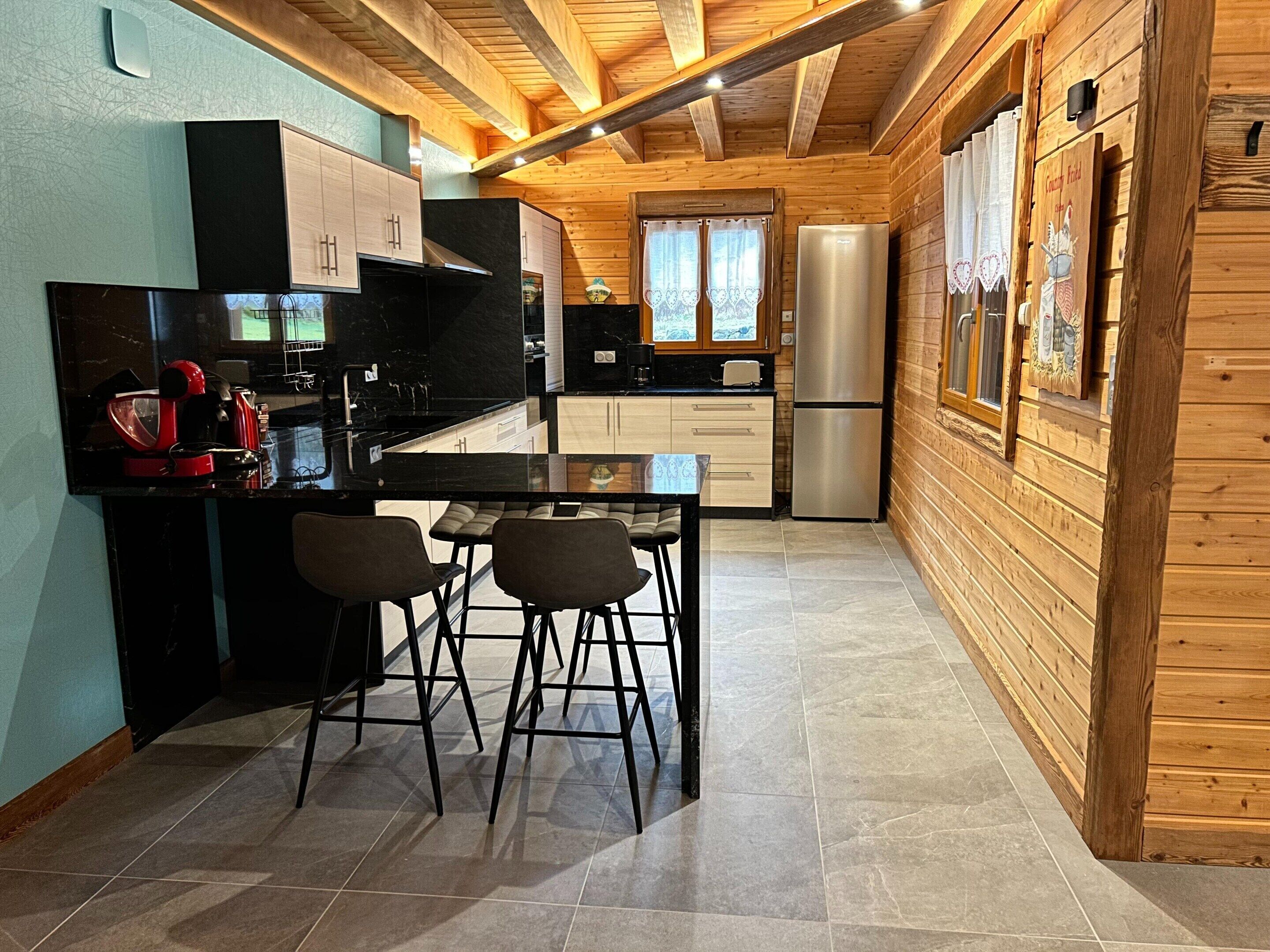Chalet | Private kitchen | Fridge, highchair