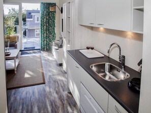 Apartment | Private kitchen - Modern Hotel Suite, a Stone's Throw From the sea on Texel (De Koog)