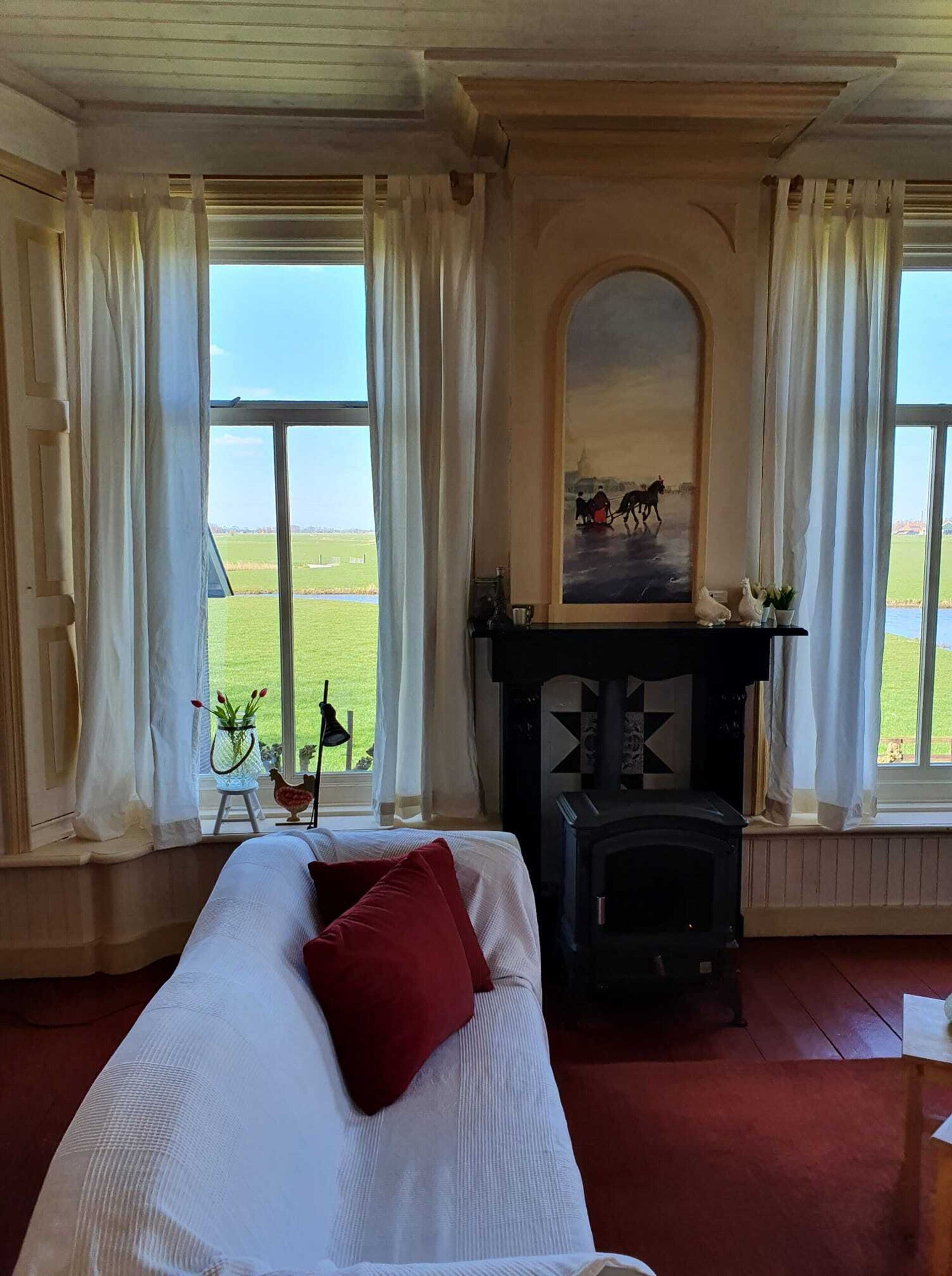 Huis | Woonkamer | Een open haard