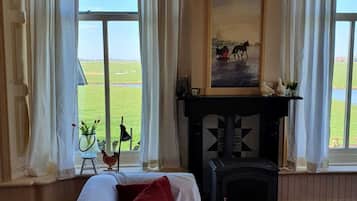 Ferienhaus | Wohnzimmer | Kamin
