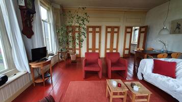 Ferienhaus | Wohnzimmer | Kamin