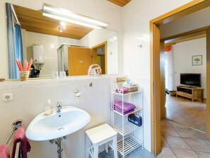 House | Bathroom | Shower, hair dryer, towels - Modern Holiday Home in Beckedorf With Terrace (Südheide)