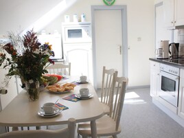 Apartamento | Cocina privada | Trona infantil