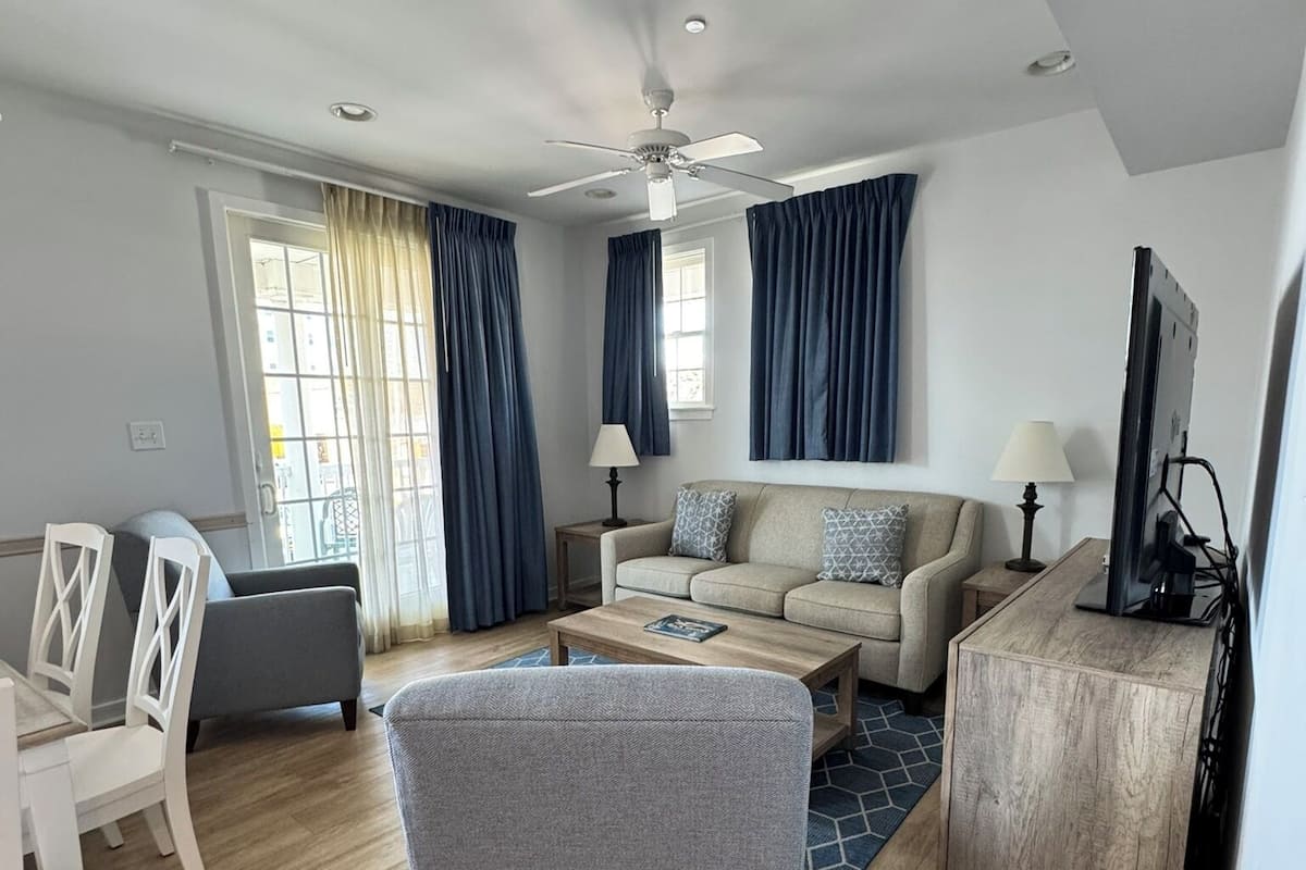 Apartment, 2 Bedrooms | Living area | Flat-screen TV, DVD player
