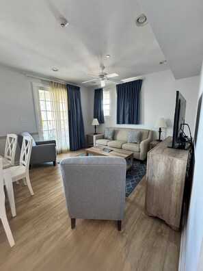 Apartment, 2 Bedrooms | Living area | Flat-screen TV, DVD player