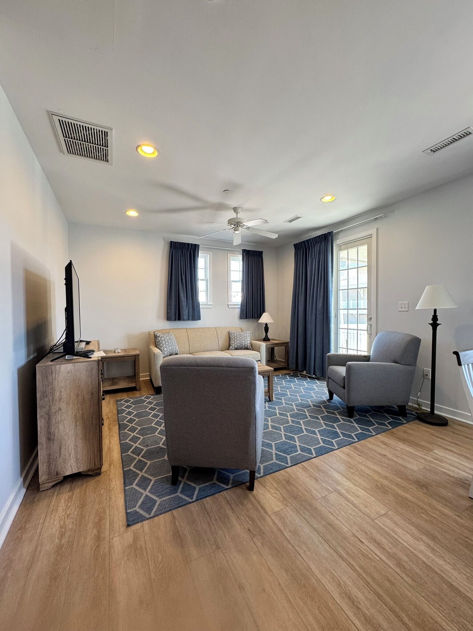 1 Bedroom Apartment 1 King | Living area | Flat-screen TV, DVD player