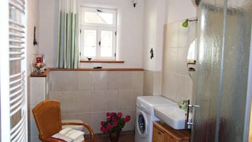 Shower, hair dryer, towels