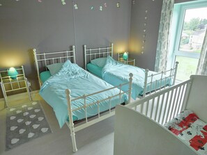 4 bedrooms, individually furnished, iron/ironing board, travel crib