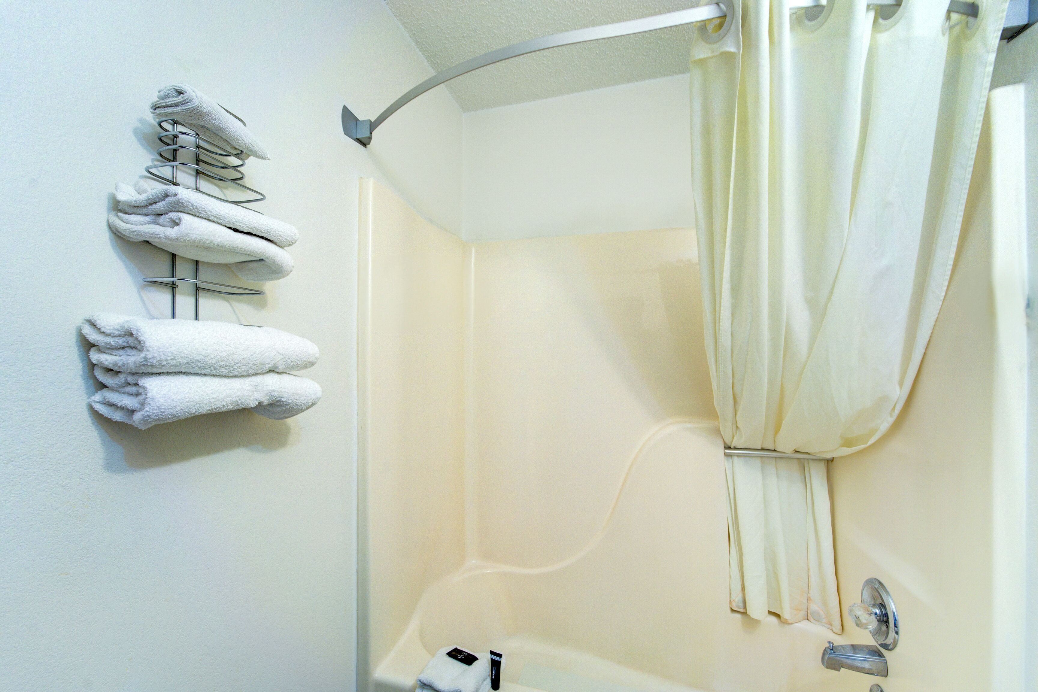 Room, 2 Double Beds, Non Smoking | Bathroom | Free toiletries, hair dryer (on request), towels