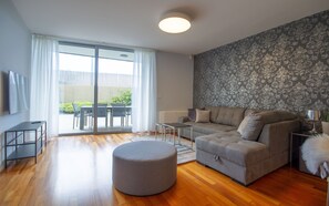 Deluxe Apartment, 2 Bedrooms, Terrace | Living area | 45-inch flat-screen TV with digital channels, LCD TV, Netflix - Apartments Lux by Locap Group (Piran)