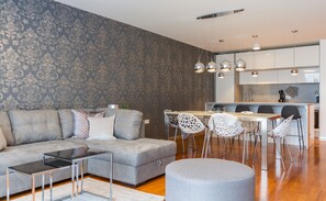 Deluxe Apartment, 2 Bedrooms, Terrace | Living area | 45-inch flat-screen TV with digital channels, LCD TV, Netflix