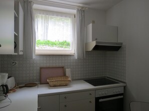 Een magnetron, een oven, een kookplaat