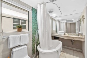 Combined shower/bathtub, hair dryer, towels, soap - Ocean Drive Apartments with Rooftop Pool, South Beach Miami (Miami Beach)
