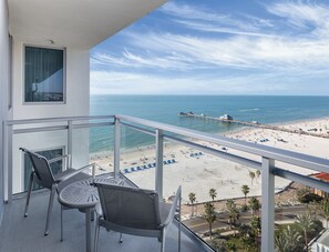 Enjoy stunning ocean views from this balcony overlooking the beach and pier.