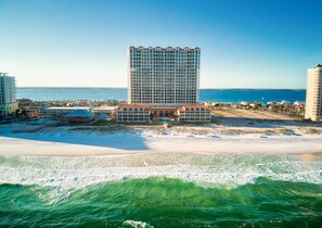 On the beach, sun loungers, beach towels