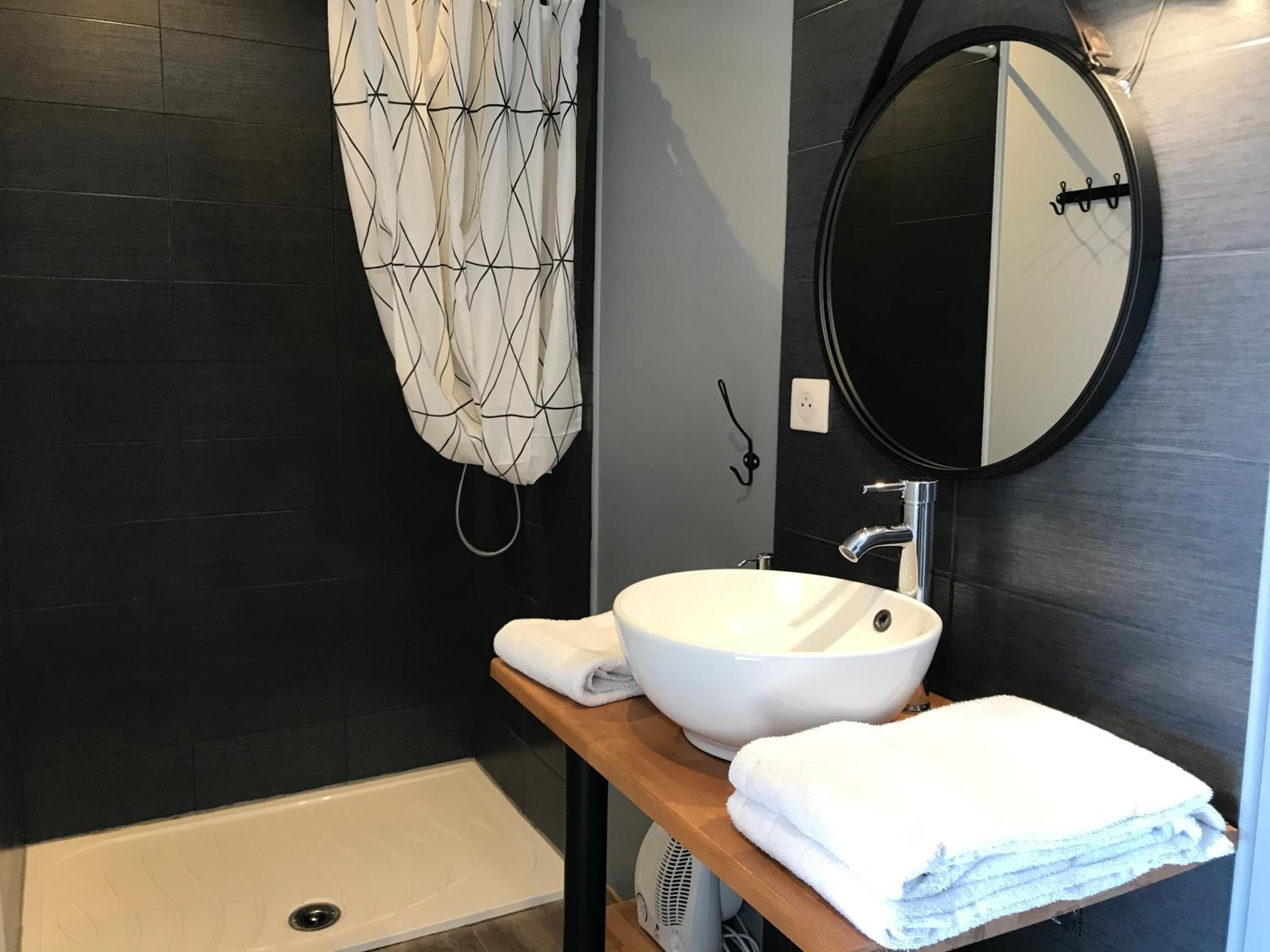 Shower, free toiletries, hair dryer, towels
