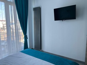 Apartment Infinity | Individuelt innredet, blendingsgardiner, lydisolert og strykejern/-brett