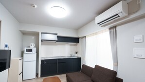 Apartment, 2 Bedrooms | Living area | Flat-screen TV
