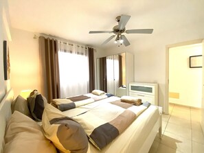 1 habitación, tabla de planchar con plancha, wifi gratis y ropa de cama 