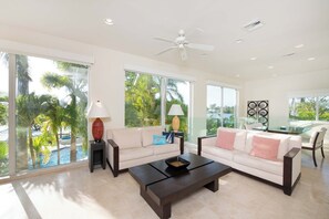 Télévision à écran plat, console de jeux vidéo, chaîne hi-fi