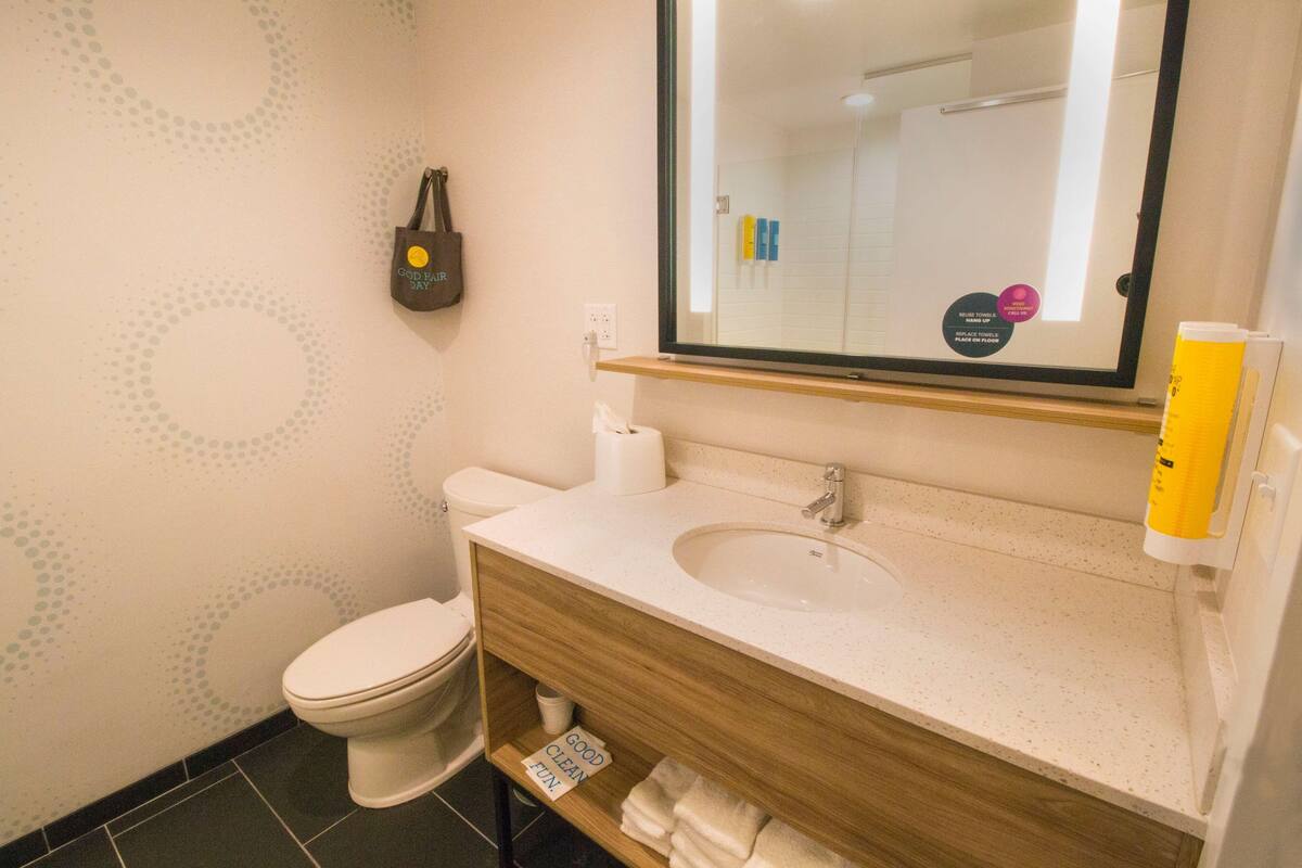 combined shower/bathtub, free toiletries, hair dryer, dressing gowns