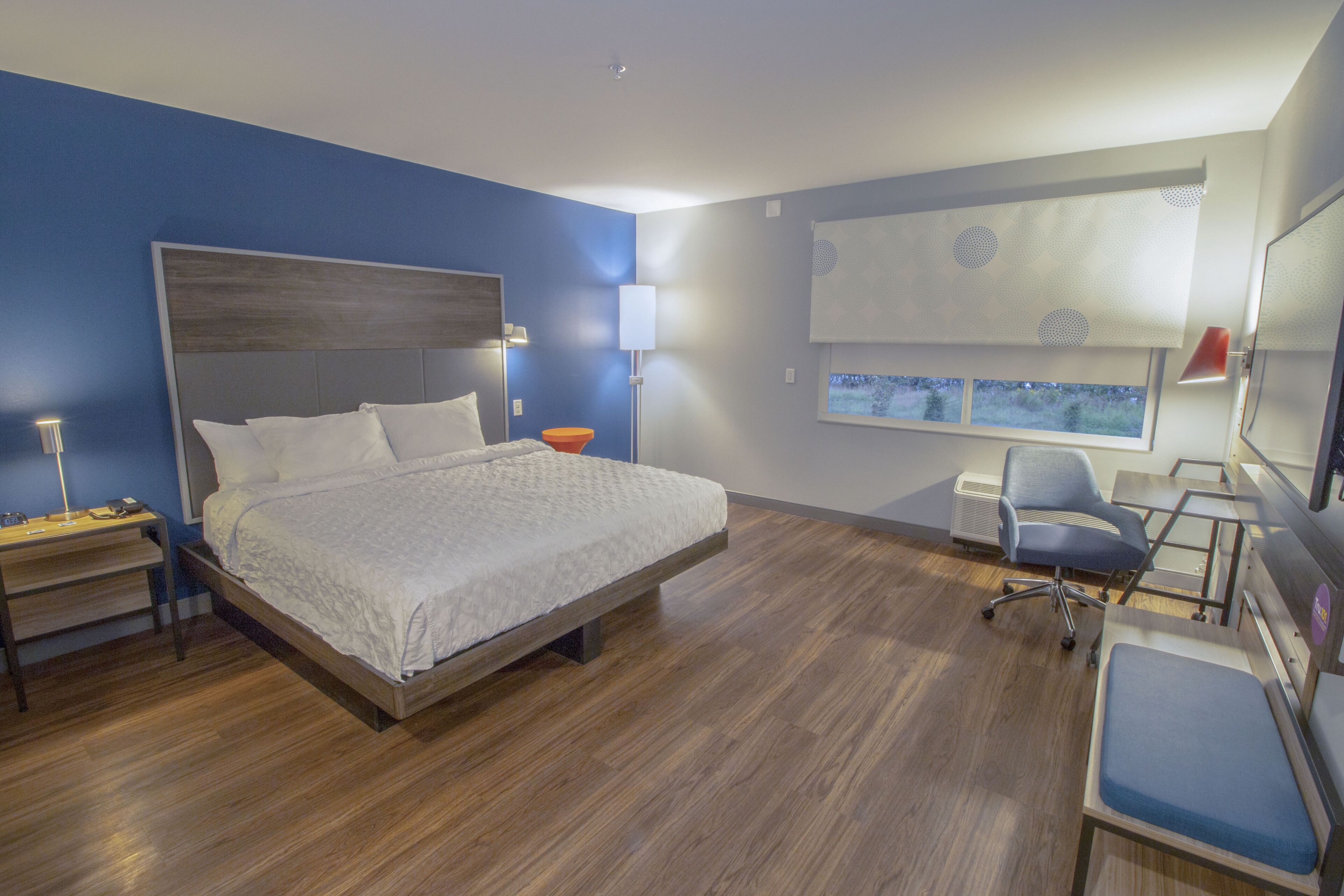 premium bedding, desk, laptop workspace, blackout curtains