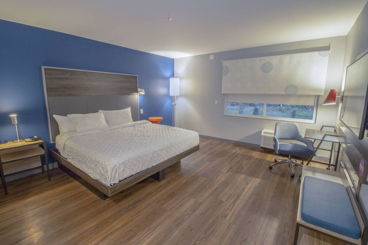 premium bedding, desk, laptop workspace, blackout curtains