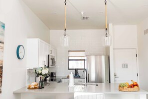 Full-sized fridge, microwave, oven, stovetop - The Suites at Fishermen’s Village- 2 Bedroom Suites (Punta Gorda)