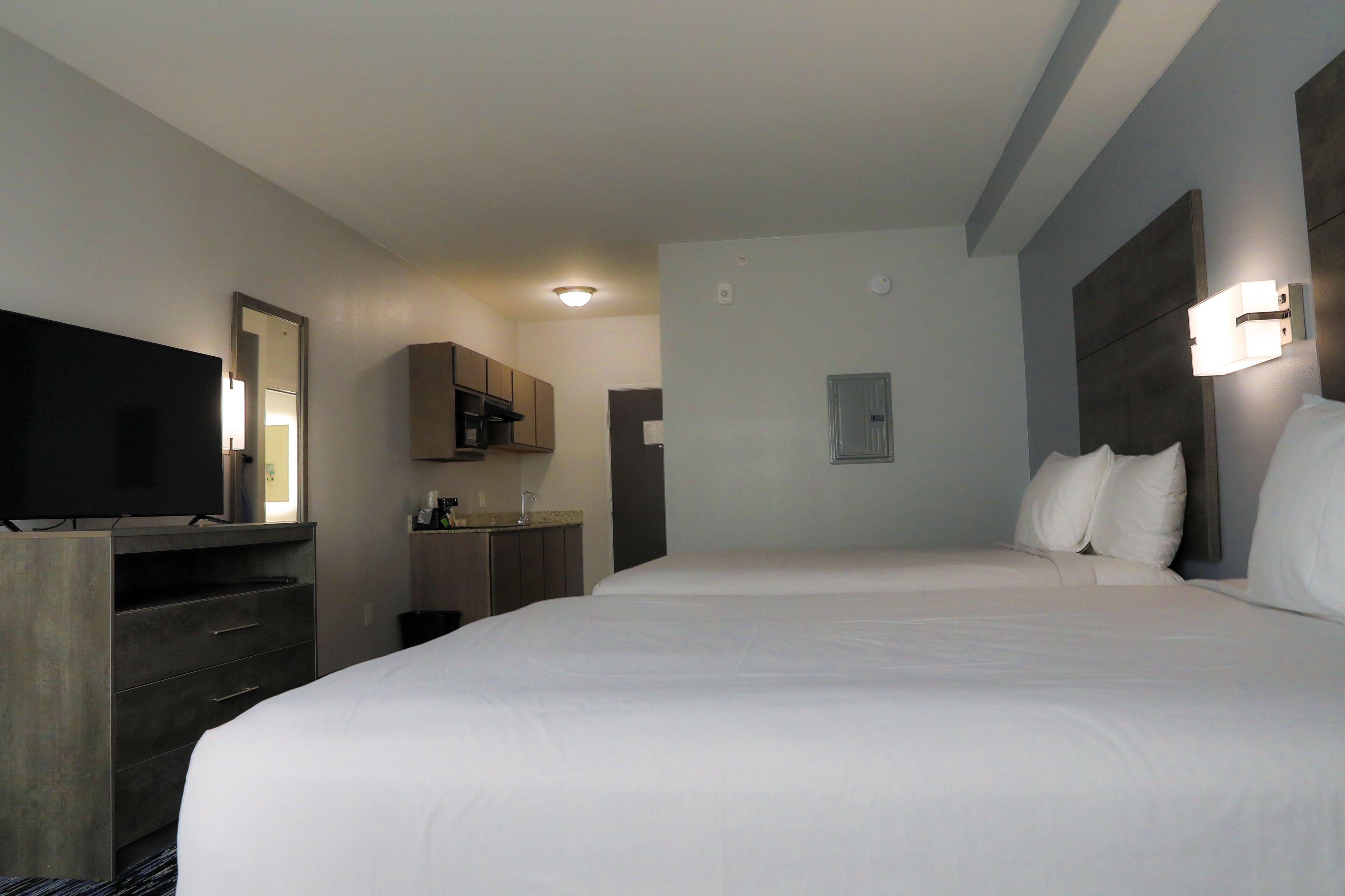 room, 2 queen beds, kitchenette | 1 bedroom, desk, blackout curtains, iron/ironing board